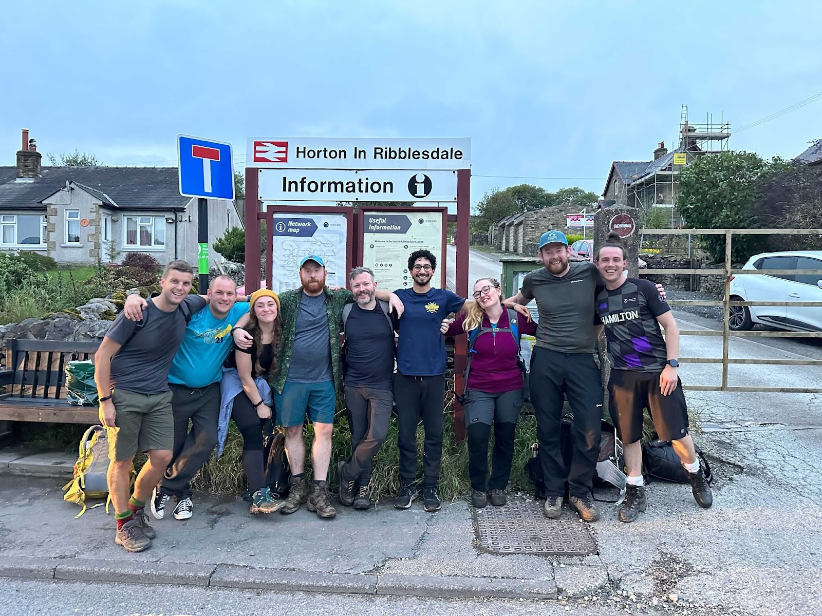 The team posing for a photo after a hike